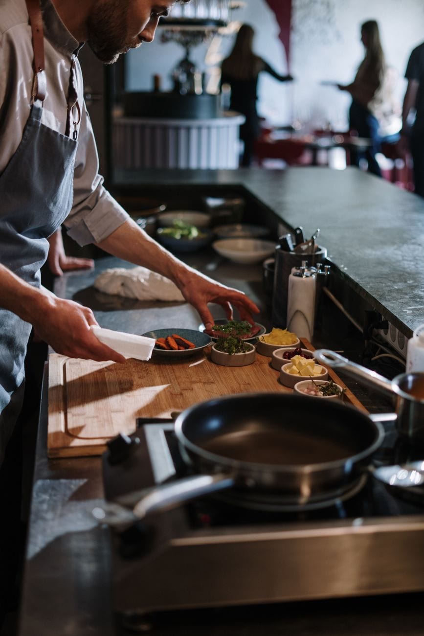 Food preparation in restaurant kitchen