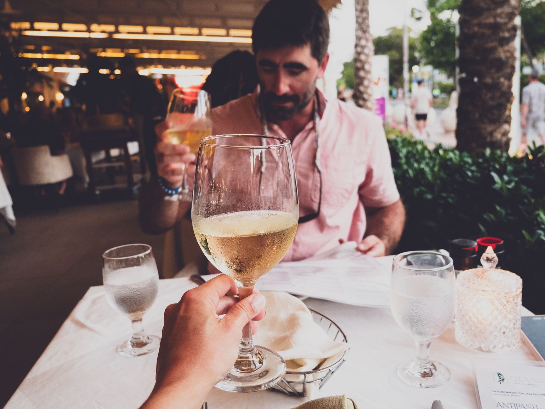 Couple toasting at Caspian
